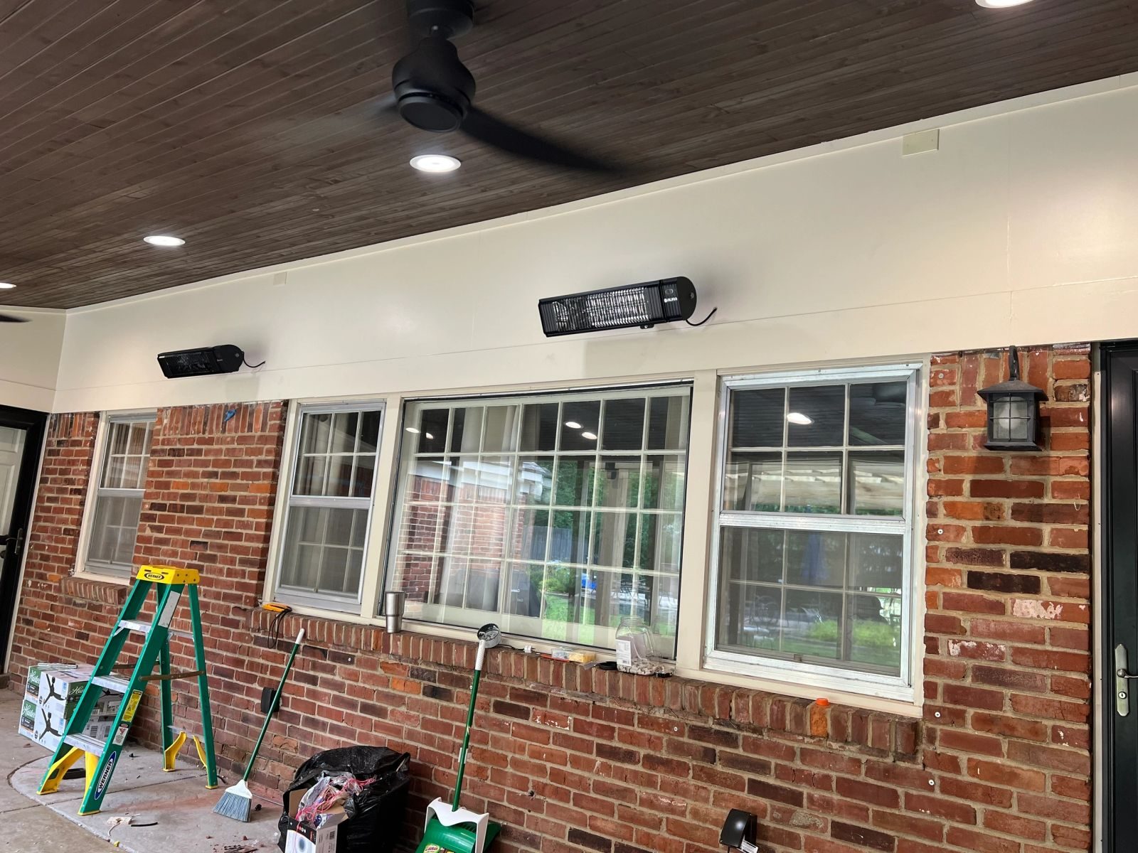 Covered patio with infrared heaters, ceiling fan and recessed lights