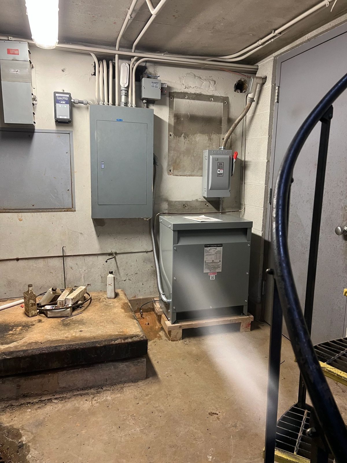 Commercial electrical room with panel, disconnect and transformer